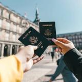 people holding passports